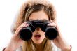 beautiful woman watching with binoculars