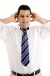business executive with his hands on head