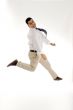 businessman leaping in mid of air