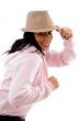 side pose of smiling model holding hat