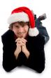 smiling laying male wearing christmas hat