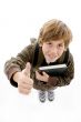 smiling school boy with thumbs up