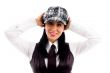 young woman in cap posing with her arms