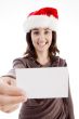 woman wearing christmas hat holding business card