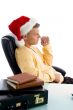 side pose of male wearing christmas hat