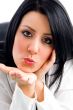 woman giving flying kiss