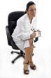 side pose of sitting doctor with writing pad