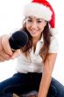 model wearing christmas hat and showing microphone
