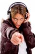 front view of pointing woman enjoying music