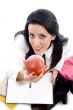 student holding an apple