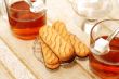 table set for high tea with sweet cookies