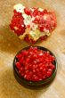 broken ripe pomegranate fruit and seeds