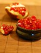 broken ripe pomegranate fruit and seeds