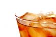 ice filled soft drink isolated on white