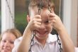 Young Boy Smiles for The Camera