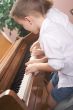 Children Playing the Piano