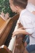 Children Playing the Piano