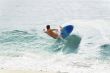 Surfer Balancing on Wave