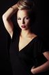 sexy blond girl on black background