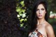 beautiful girl standing on ivy