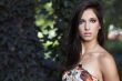 beautiful girl standing on ivy