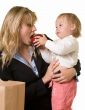 Baby feeding mom