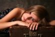 Girl with old suitcase