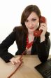 Talking on an old fashioned phone