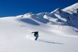 snowboarder ride in powder