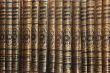 Row of old books cover spines