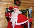 Santa Claus near wooden door