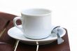 White cup and spoon