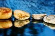 Sea stones on dark blue