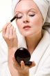 Putting on makeup