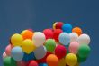 Countless colorful balloons in deep blue sky