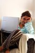 young woman using laptop