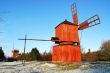 Two Red Wooden Windmills