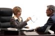 Woman executive - coaching an employee