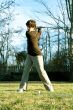 Youth golfer in swing