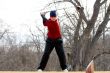 Youth golfer hitting a tee shot