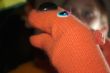 Homemade orange sock puppet