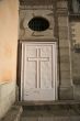 white door with cross