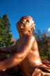 red boy statue