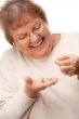 Attractive Senior Woman and Pills

