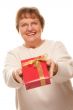 Attractive Senior Woman with Gift
