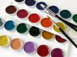 paints with brushes