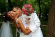 Groom kissing bride