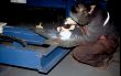 Welder at work close up