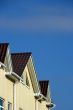 modern urban roof over blue sky