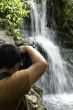 Tropical tourist taking photos